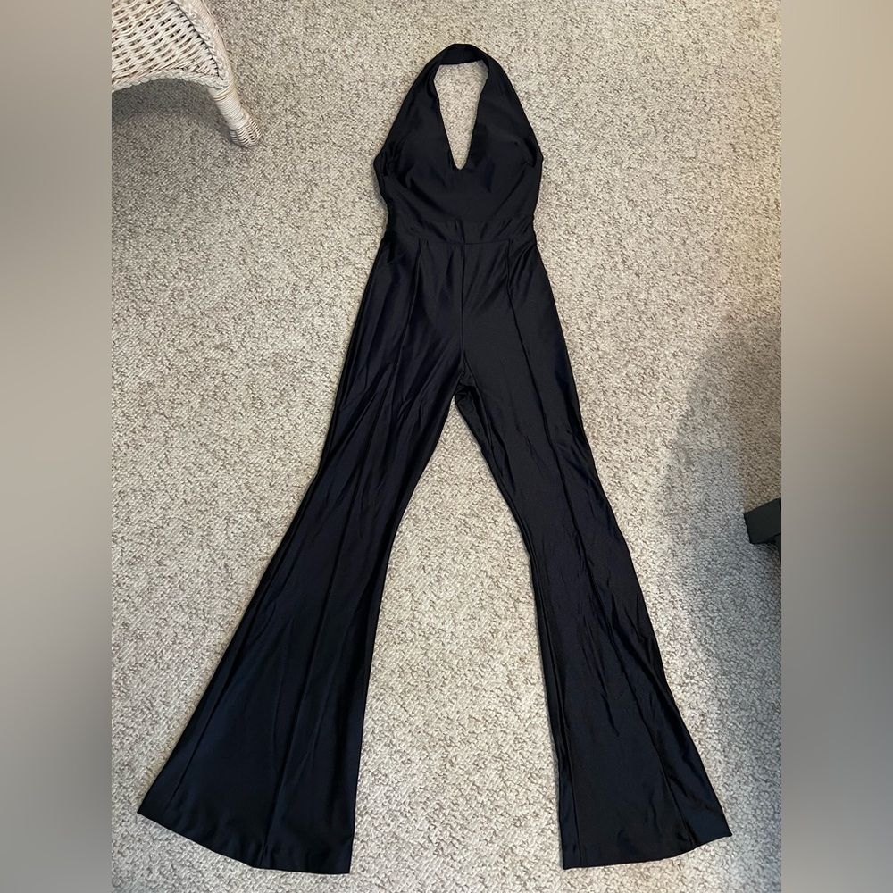 Halter black jumpsuit, open back with flared leg